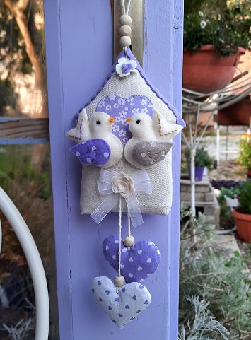 Little bird house filled with lavender