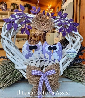 White heart-shaped wreath with lavender owls